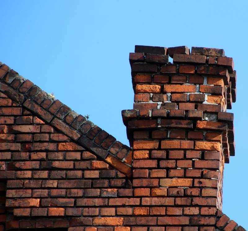 Signs Your Canyon Country Home Needs a Chimney Inspection Damaged chimney on an Canyon Country home showing cracks and missing mortar